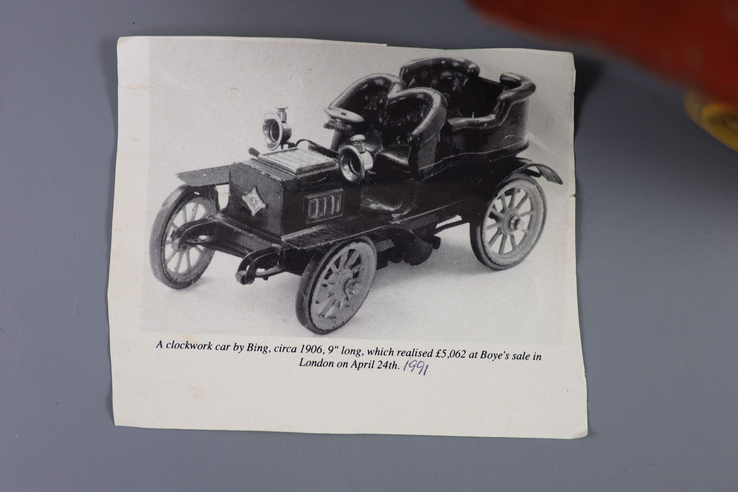 A Bing clockwork tinplate car, c.1906, length 9.5in. width 5in., with original card box and winding key